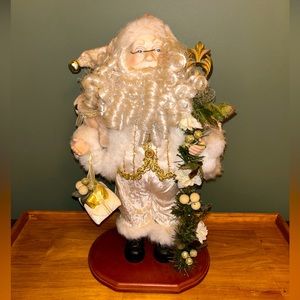 Woodland Santa holding garland